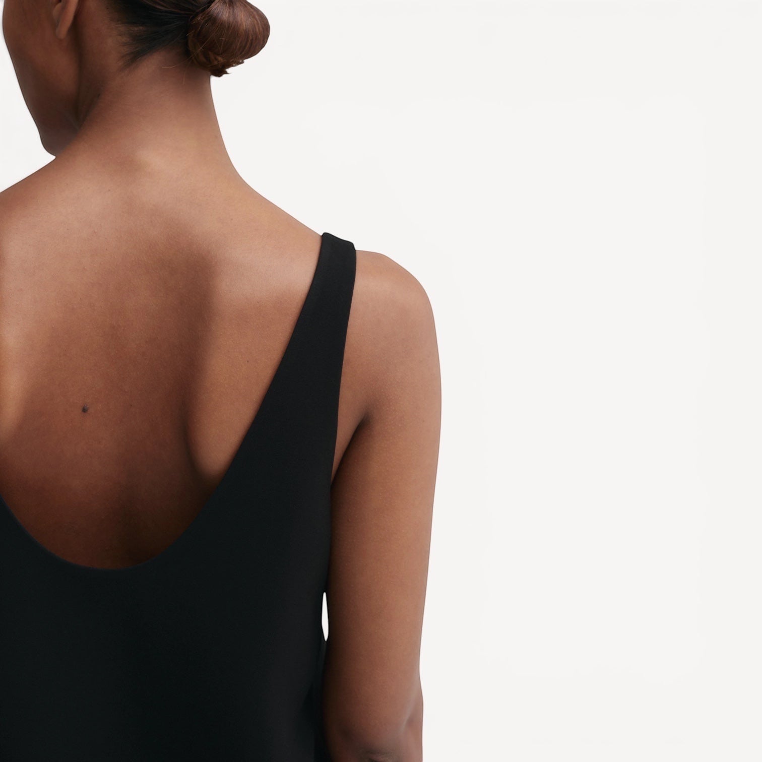 Lula Studio Prague black crepe acetate blend top with a deep scoop neckline and back, relaxed fit.