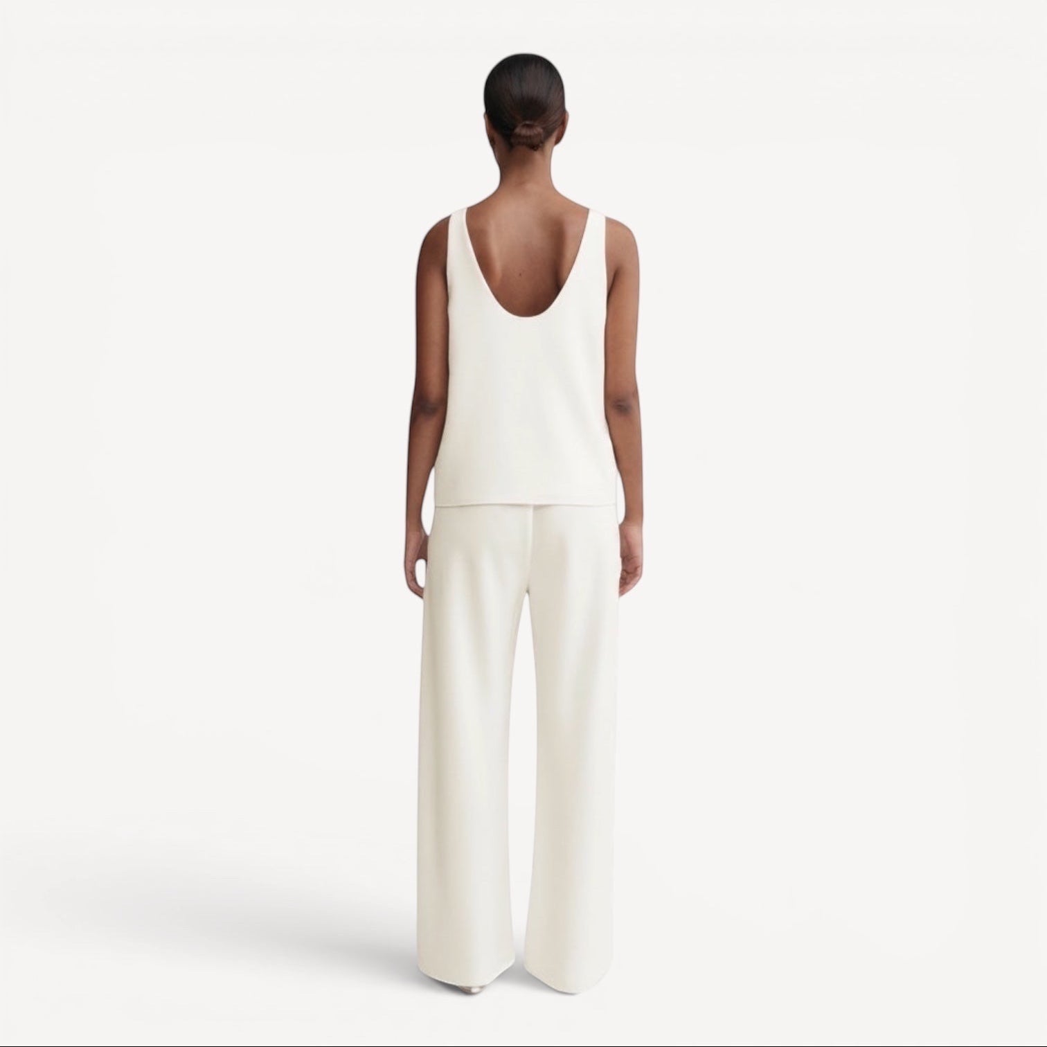 Lula Studio Prague cream crepe blend Romy top with a deep scoop neckline and wide-leg pants.