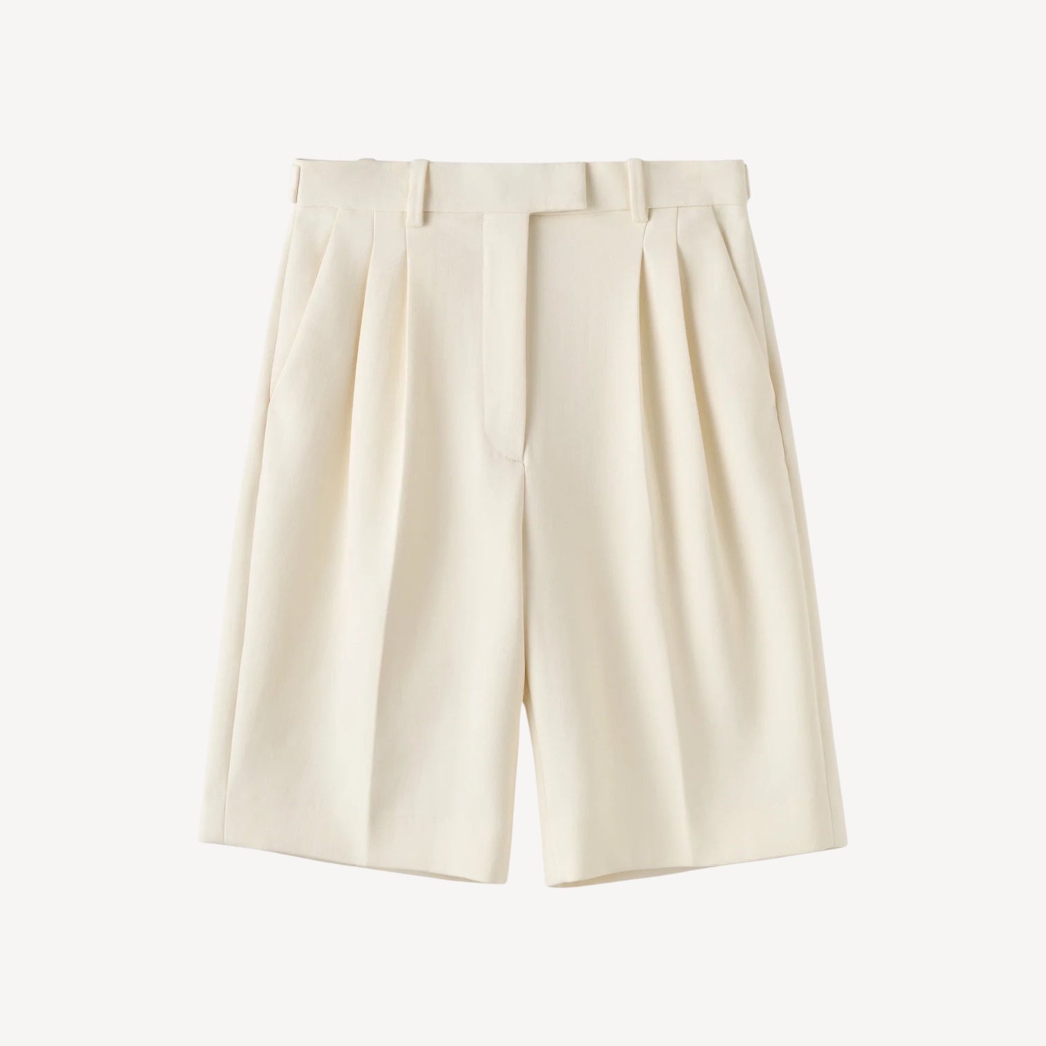 Lula Studio Prague cream woven blend shorts with front pleats and adjustable side tabs.