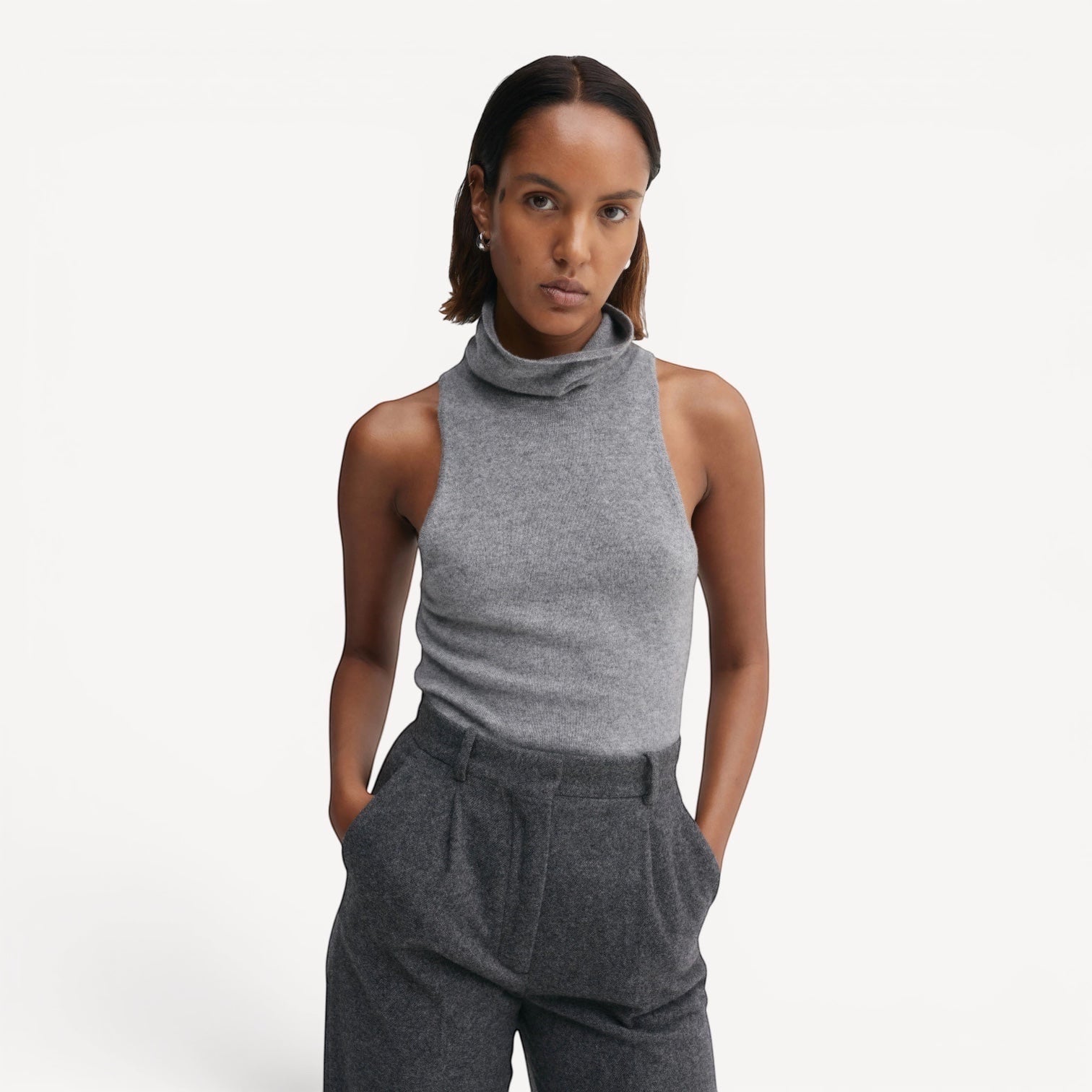 Lula Studio Prague grey sleeveless cashmere turtleneck top with a racerback design.