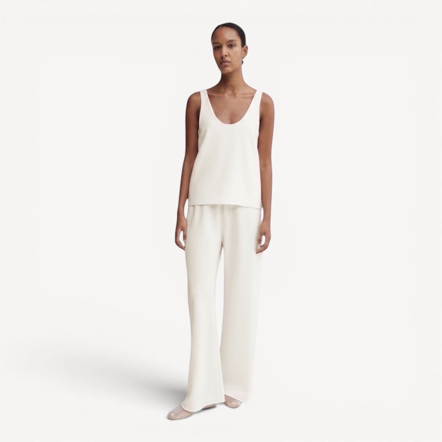 Lula Studio Prague Romy Crepe Top in cream, a sleeveless tank with a scoop neckline and relaxed fit, paired with matching wide-leg trousers.